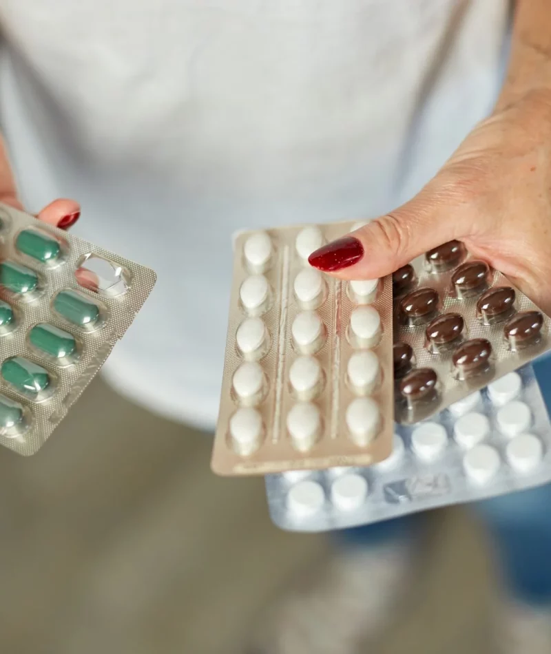 A blister pack of contraceptive pills held in the hand