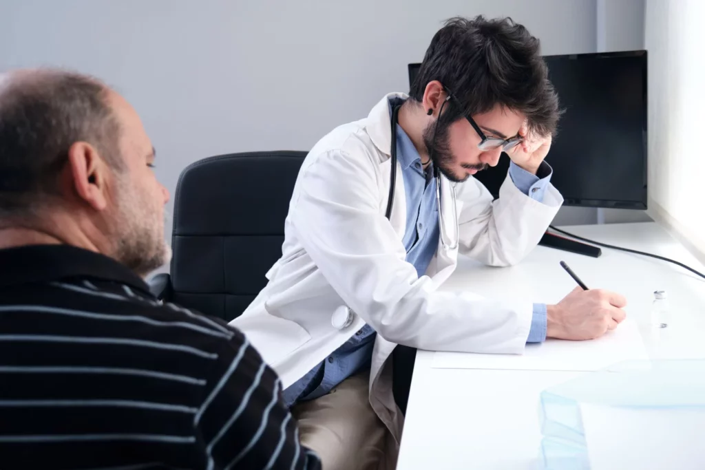 A doctor writing a prescription