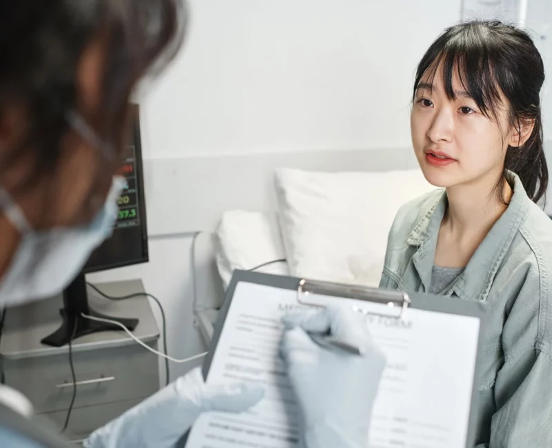A doctor talking with a patient