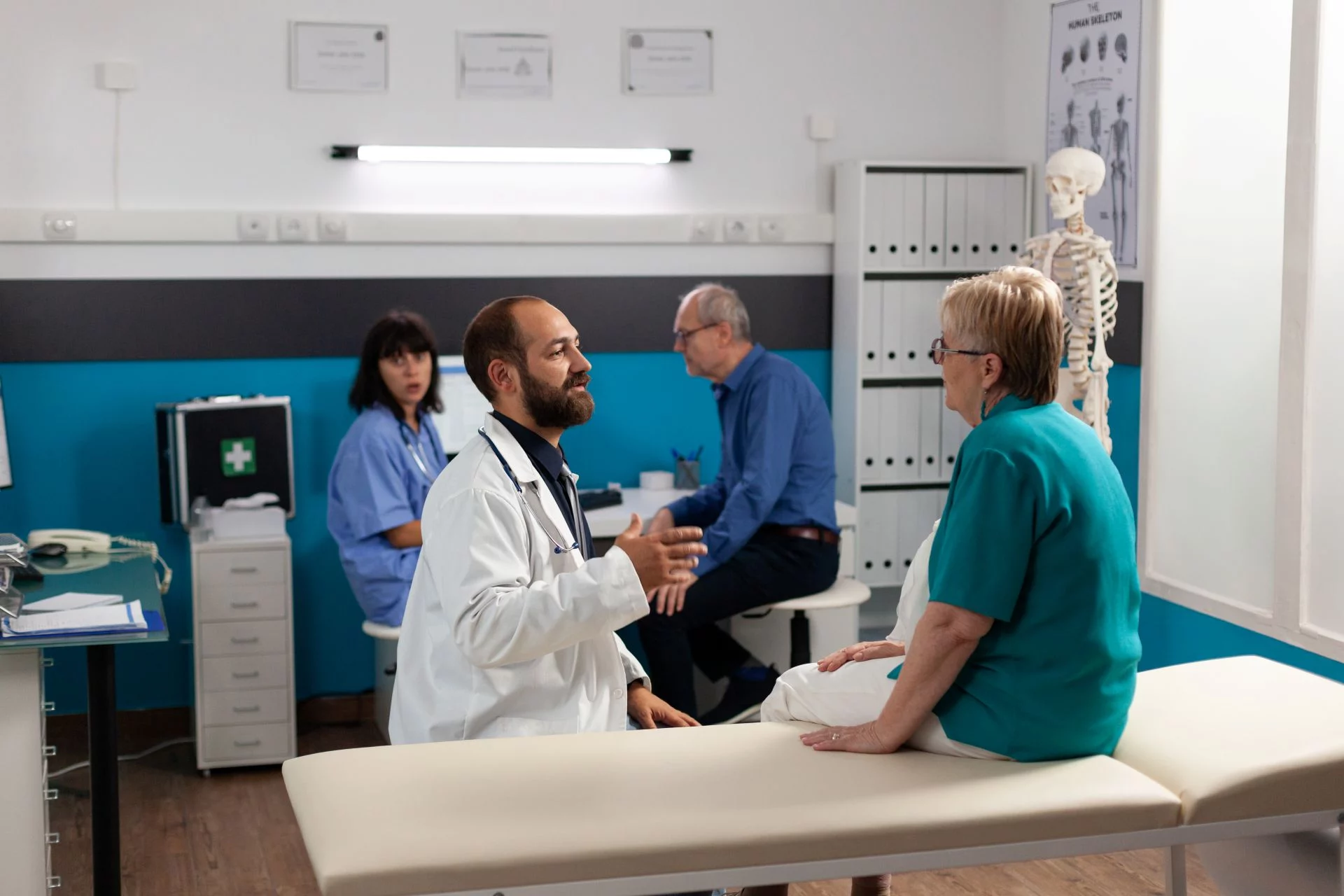 A patient talking with a doctor about an injury