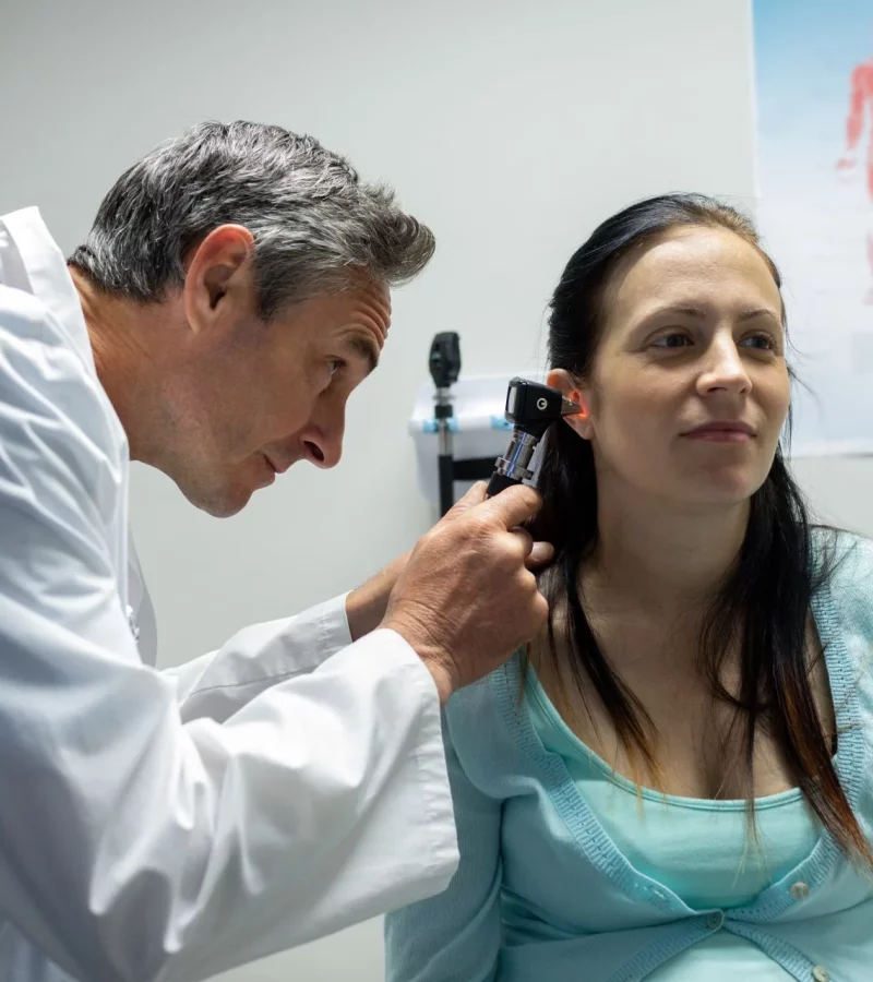 A doctor examining a patient